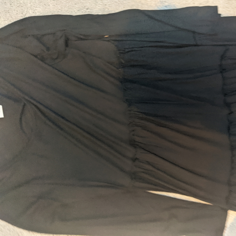 Plain black, ruffled dress